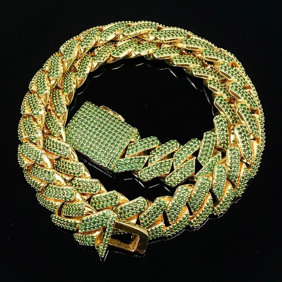 gold diamond iced out miami cuban chain with emerald green stones