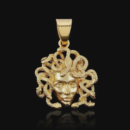 Iconic gold Medusa gorgon head pendant on rope chain